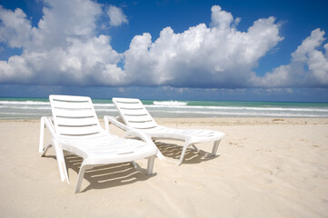 sunbeds and costline  at tropical beach