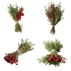 Fototapeta premium Fresh red berries and green herbs arranged in bundles for decoration