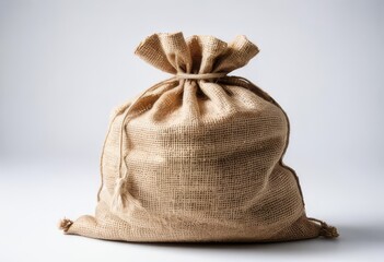 A close-up photo of peanuts in a sack against a white background
