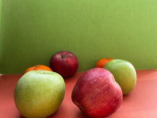 green red apples, mandarin and healthy eating