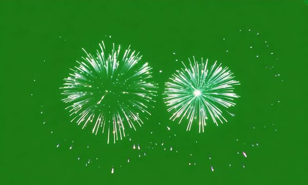 A green screen shot featuring a vibrant and colorful fireworks display lighting up the sky with bursts of light and colors