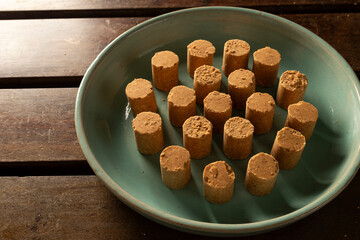 Sweet Brazilian Peanut Called Paçoca on a blue plate