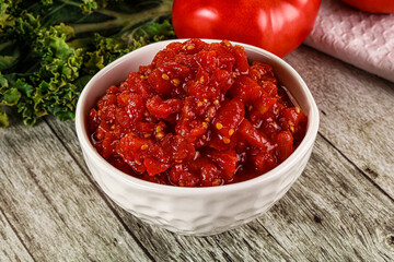 Diced ripe tomato with sauce