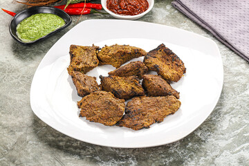 Grilled beef barbecue with spises