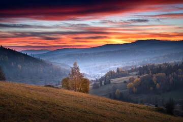 Sunrise Over Misty Mountain Valley