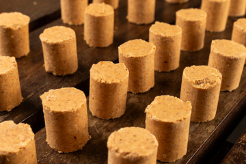 Sweet Brazilian Peanut Called Paçoca on a wooden desk