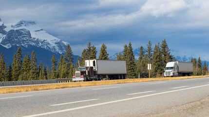 Heavy Cargo on the Road. A truck hauling freight along a highway. Taken in Alberta, Canada