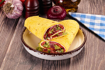 Burrito with tuna and vegetables wrap