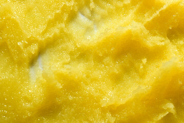 Background and texture of melted butter. Close-up.