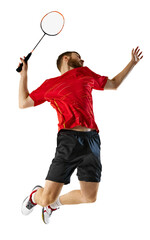 Badminton athlete dives to hit shuttlecock, giving it his all in last-second effort to keep game going against transparent background. Concept of movement, professional sport, motion, hobby. Ad