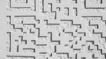 Sculptural abstract of a 3D matrix barcode, carved in white sand, on a sunny morning at a sand sculpting festival in Florida, for motifs of information and digital technology, in black and white © Kenneth