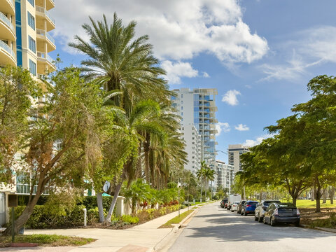 Perspective of an upscale residential street downtown on a sunny afternoon in Sarasota, Florida, for urban, travel, and coastal motifs