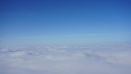 Sea of fog and clouds over the flatlands of Switzerland