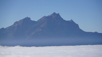 Pilatus Mountain in central Switzerland rising from lowland fog