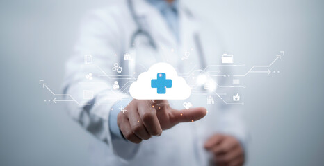 Doctor interacting with a holographic cloud featuring a medical cross and data connections, representing cloud-based healthcare, telemedicine, and AI-driven medical technology solutions