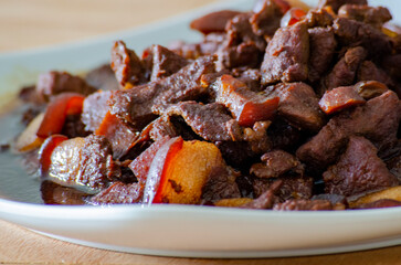 Side view of pork cooked in soy sauce with customizable space for text. Asian food concept