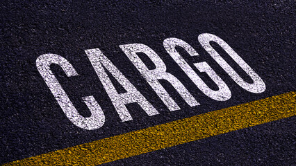 CARGO, cargo text written and yellow line on asphalt road ground.