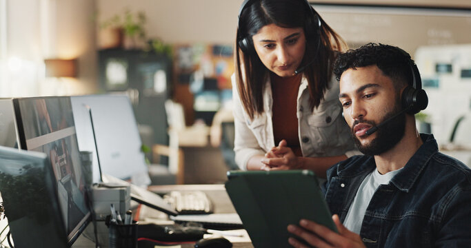 Call center, woman and man with training, tablet and online advice in technical support office. Manager, customer service and IT consultant with headset, computer and help on digital app for teamwork