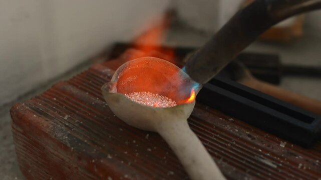 Different goldsmiths tools on the jewelry workplace. Jeweler at work in jewelry. Desktop for craft jewelry making with professional tools