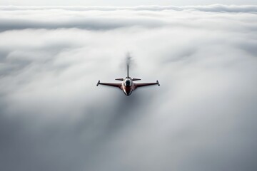 Red jet flying above a sea of clouds.