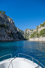 A bay in the parc of the calanques near Marseille and Cassis with light blue water on a sunny day.
