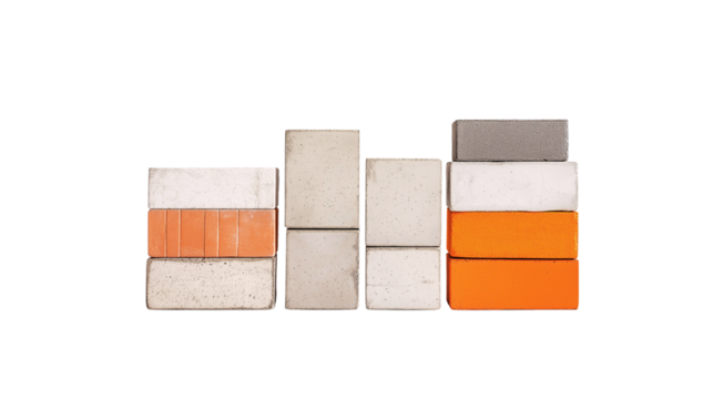 Set of Bricks and Concrete Blocks - White, Gray, and Orange in Perspective View