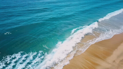 Breaking waves create geometric patterns on sandy beach aerial view of pristine ocean minimalist landscape photography