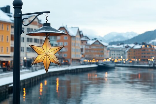  Un farol en forma de estrella ilumina una calle junto a un r&iacute;o rodeado de edificios nevados, creando un ambiente c&aacute;lido en invierno.
