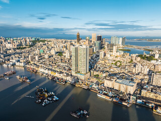 Fototapeta premium Modern city buildings with skyline and natural scenery in Macau