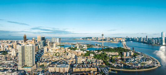Obraz premium Modern city buildings with skyline and natural scenery in Macau