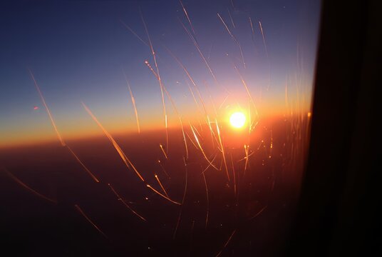 Scratches on Window  Sunset Macro shot of scratches on the airpl