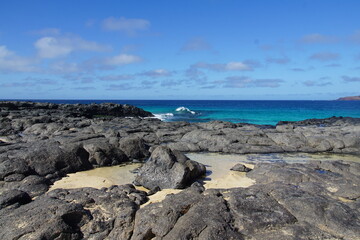 playa de las conchas, La Graciosa, lanzarote, canary islands, atlantic ocean, blue water, waves, rough sea, november 2024, holiday, nature, volcanic rocks, volcanic island, spain, islas canarias