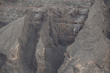 Naklejka premium View on Famara cliffs from the ferry, La Graciosa, canary islands, lanzarote, volcanic rocks, november 2024, holiday, nature, mountain, volcanic island, wild birds