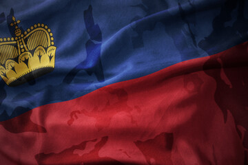 colourful waving flag of liechtenstein on the old army khaki texture background. military concept.