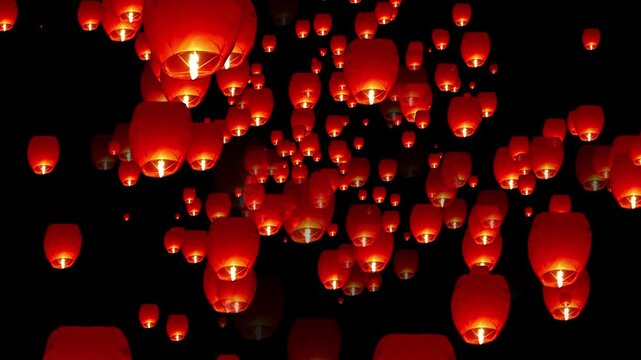 Lanterns Rising in Celebration of Thailand's Lois Kratom Festival - A Vibrant Display of Culture, Joy, and Tradition Blending Light, Motion, and Serenity. ten thousand hot air lantern in sky.