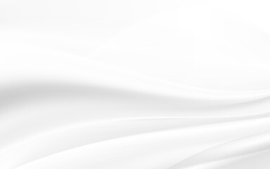 Smooth flowing white waves create an abstract design on a grey background.