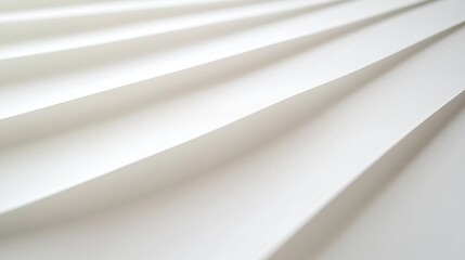 Obraz premium Smooth White Paper with Faint Linear Creases Spread Across the Surface, Capturing Subtle Textures and Patterns Ideal for Backgrounds and Design Applications