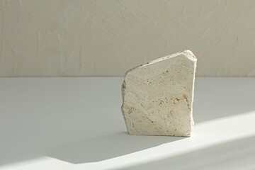 Concrete stone podium against shadow composition for product presentation.