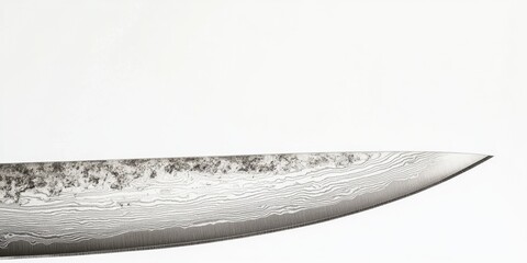 Obraz premium A detailed shot of a knife blade on a white background, suitable for use in crime or thriller scenes
