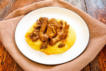 Traditional and rustic Brazilian dish, free-range chicken with polenta. Real food