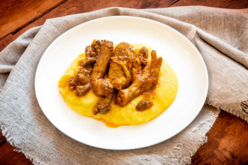 Traditional and rustic Brazilian dish, free-range chicken with polenta. Real food