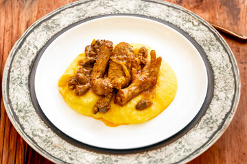 Traditional and rustic Brazilian dish, free-range chicken with polenta. Real food