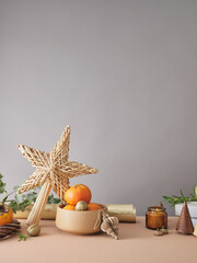 Creative still life with holiday decorations and gifts. Neutral background, copy space