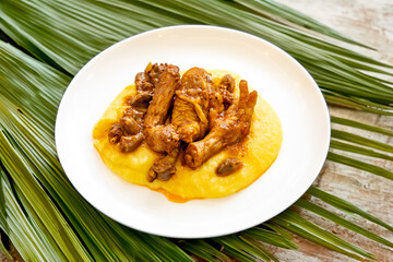 Traditional and rustic Brazilian dish, free-range chicken with polenta. Real food