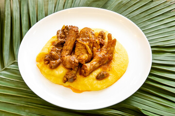 Traditional and rustic Brazilian dish, free-range chicken with polenta. Real food