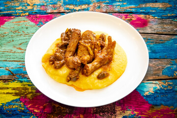 Traditional and rustic Brazilian dish, free-range chicken with polenta. Real food