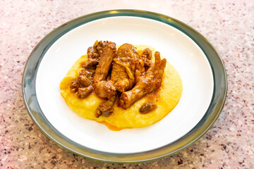 Traditional and rustic Brazilian dish, free-range chicken with polenta. Real food