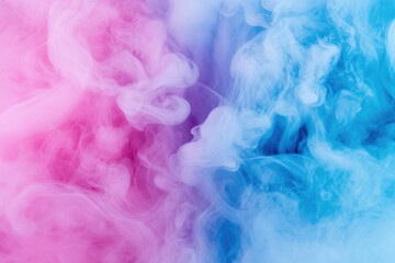 Fototapeta premium A close-up shot of swirling pink and blue smoke, suitable for use in illustrations or as a background element