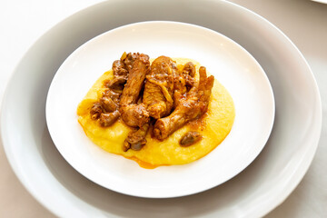 Traditional and rustic Brazilian dish, free-range chicken with polenta. Real food