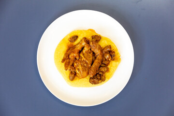 Traditional and rustic Brazilian dish, free-range chicken with polenta. Real food